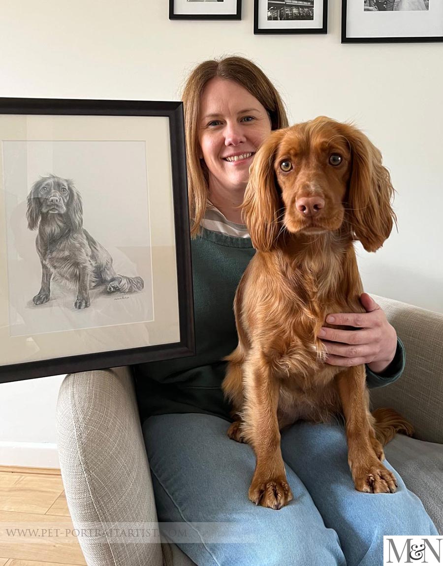 Happy client photo of Mollie with the portrait and her owner